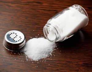 spilled-salt-bottle-on-table