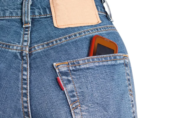 Телефон в кармане джинсов — стоковое фото